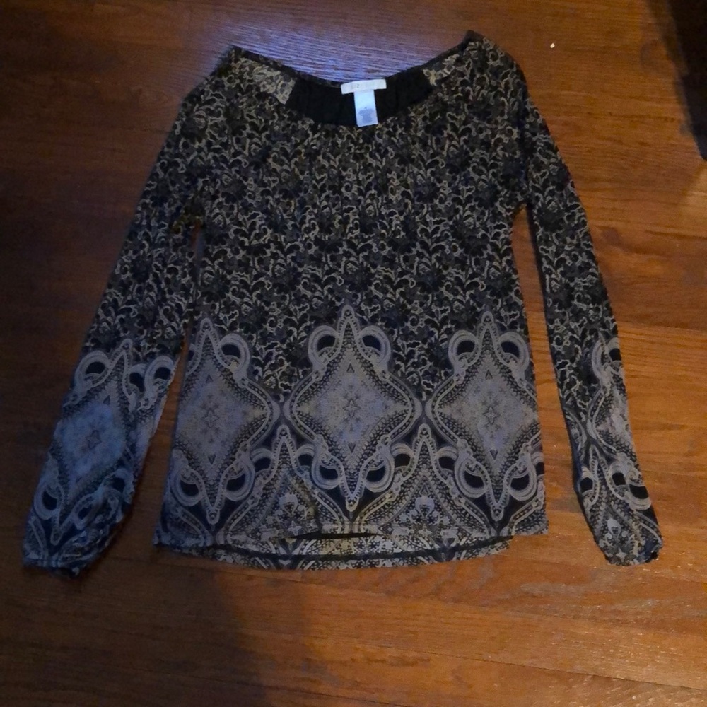 a brown and black, patterned blouse. worn once.
